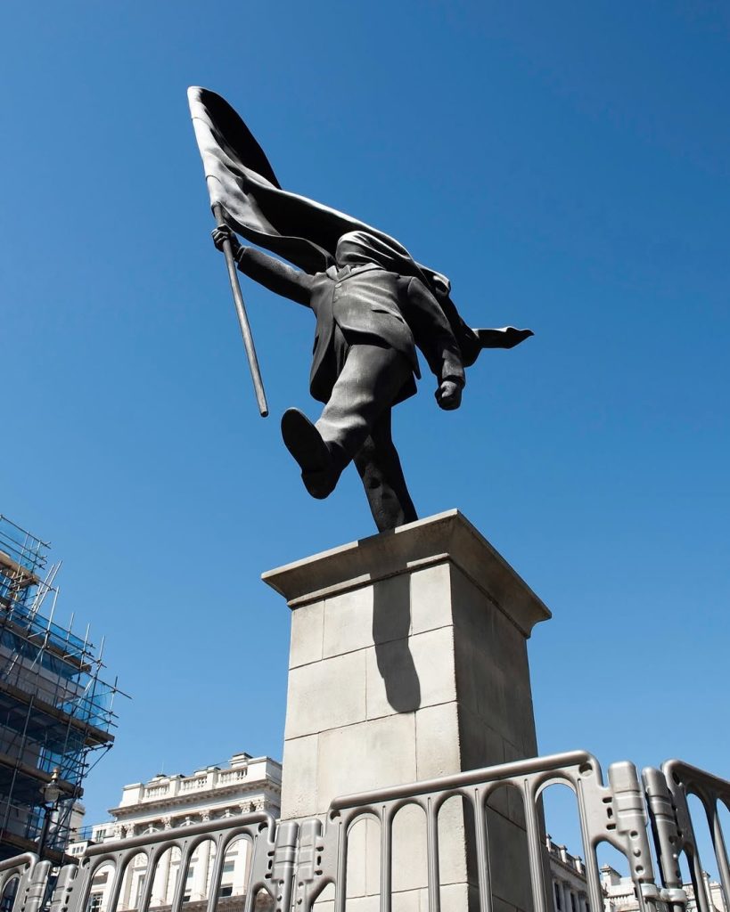 Banksy-Blind-Patriotism-Sculpture-2026-1-819x1024 Banksy’s New Sculpture in Central London: A Message of "Blind Patriotism" at Waterloo Place