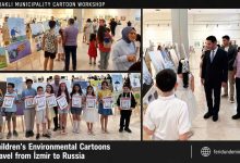 Young cartoonists from Bayraklı Municipality displaying environmental cartoons exhibited in İzmir and Russia.