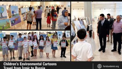 Young cartoonists from Bayraklı Municipality displaying environmental cartoons exhibited in İzmir and Russia.