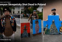Russian cartoonist Semyon Skrepetsky during a political protest shortly before his death in Poland.